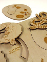 Load image into Gallery viewer, Stuka Puka inside the egg wooden puzzle