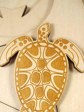 Load image into Gallery viewer, Stuka Puka inside the egg wooden puzzle